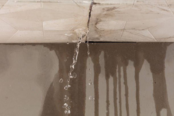 Professional Flood Damage Cleanup technician working in Maryknoll, NY